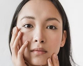 imgi_2_young-asian-brunette-touching-face-with-naked-torso