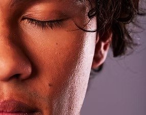 imgi_4_beauty-skincare-face-man-studio-cosmetics-self-care-facial-treatment-purple-background-cre
